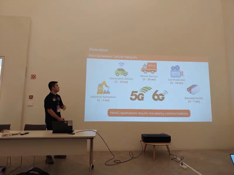 My colleague presenting our paper at the OpenRIT6G workshop